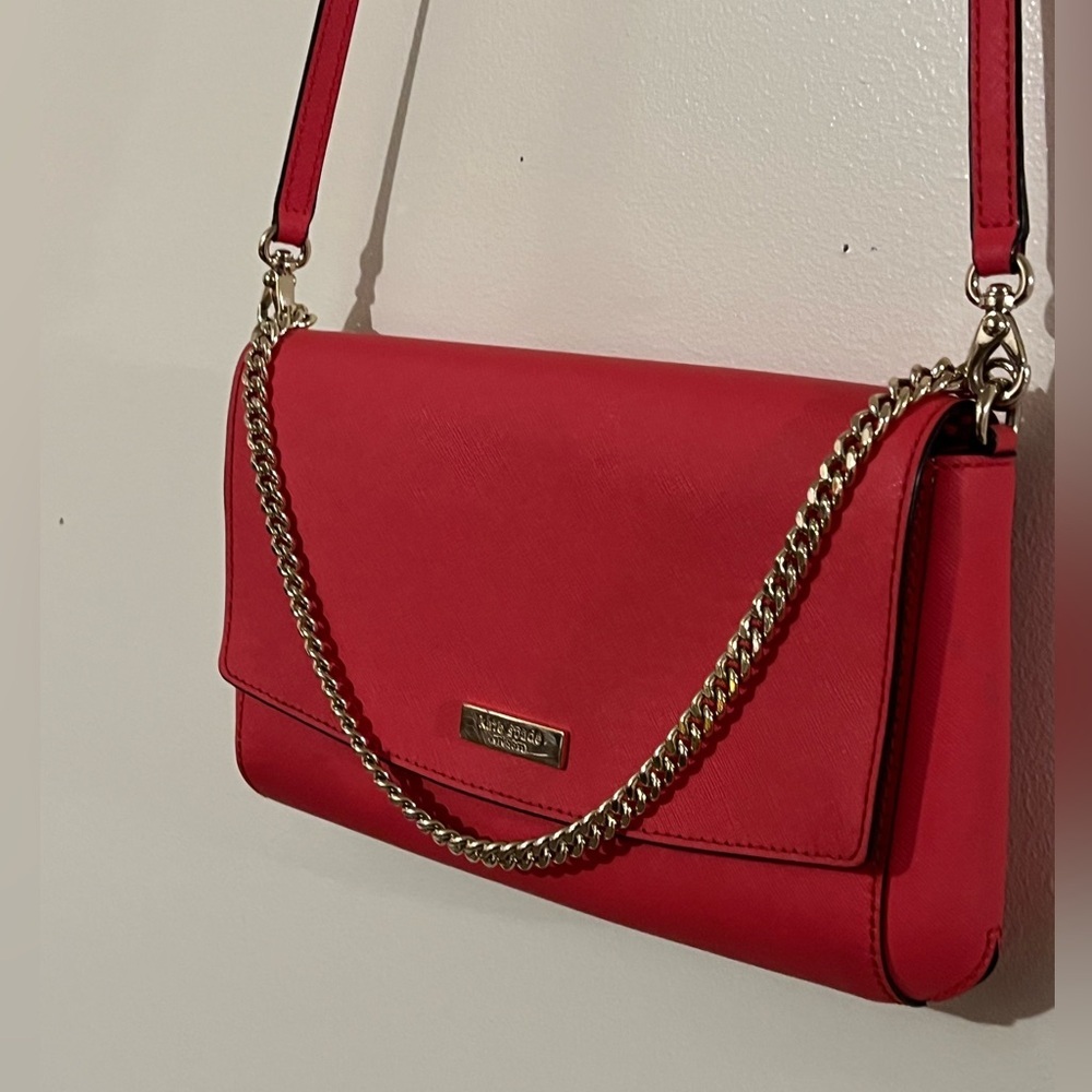 Kate Spade Red Crossbody Laurel Way purse with gold chain. Red clutch​